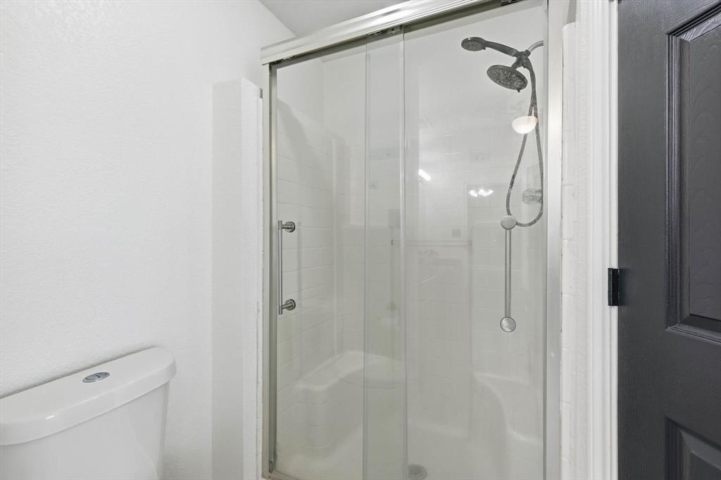 217 Seay Road Italy, TX 76651 - Photo 22 of 38 Full bathroom with a stall shower