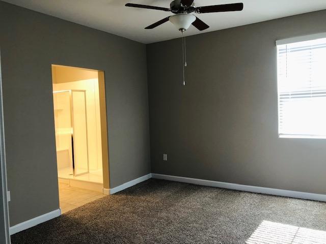 1255 North Arizona Avenue, Unit 1290 Chandler, AZ 85225 - Photo 11 of 13 a view of an empty room and a window