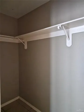 a view of a room with racks on the wall