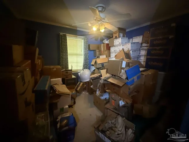 a kitchen with stainless steel appliances granite countertop a sink a stove a refrigerator a microwave oven with cabinets