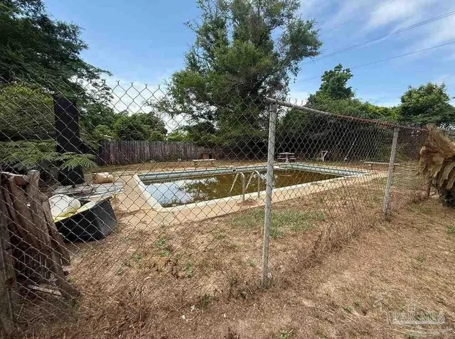 a view of a backyard with a slide