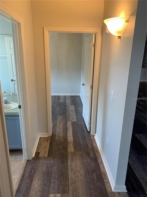 3001 Laurel Run Lane, Unit 301 Kissimmee, FL 34741 - Photo 12 of 17 wooden floor in a gallery