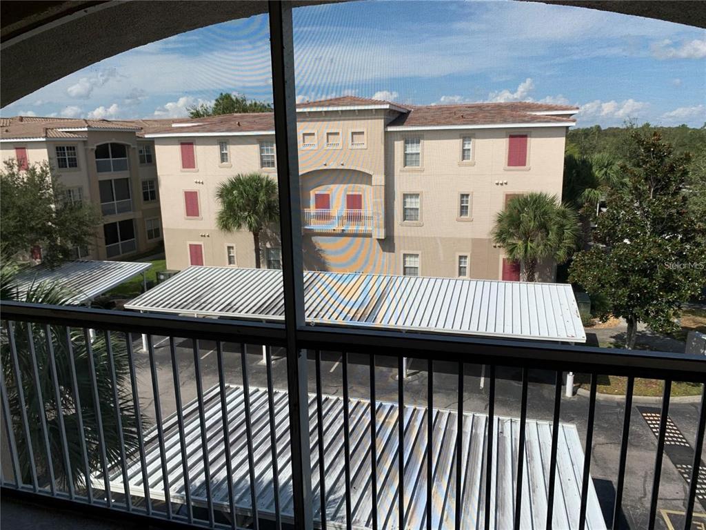 3001 Laurel Run Lane, Unit 301 Kissimmee, FL 34741 - Photo 7 of 17 a view of a wooden deck