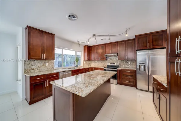 $1,590,000 | 13100 Southwest 81st Avenue, Pinecrest, FL 33156