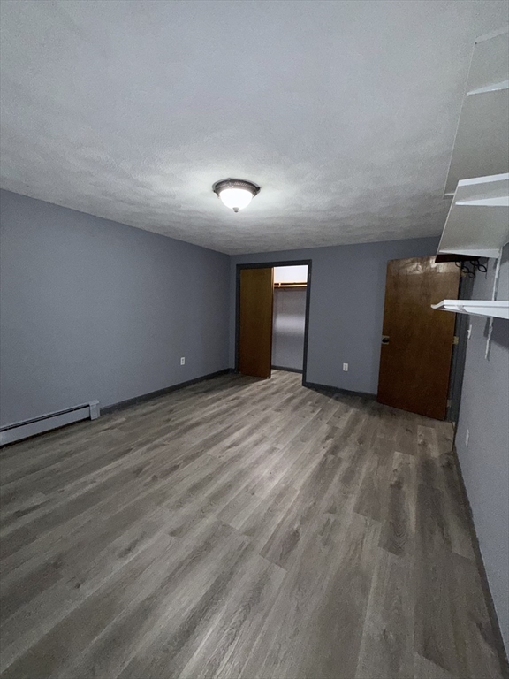 43 Haith Street, Unit B Revere, MA 02151 - Photo 7 of 9 a view of empty room with wooden floor