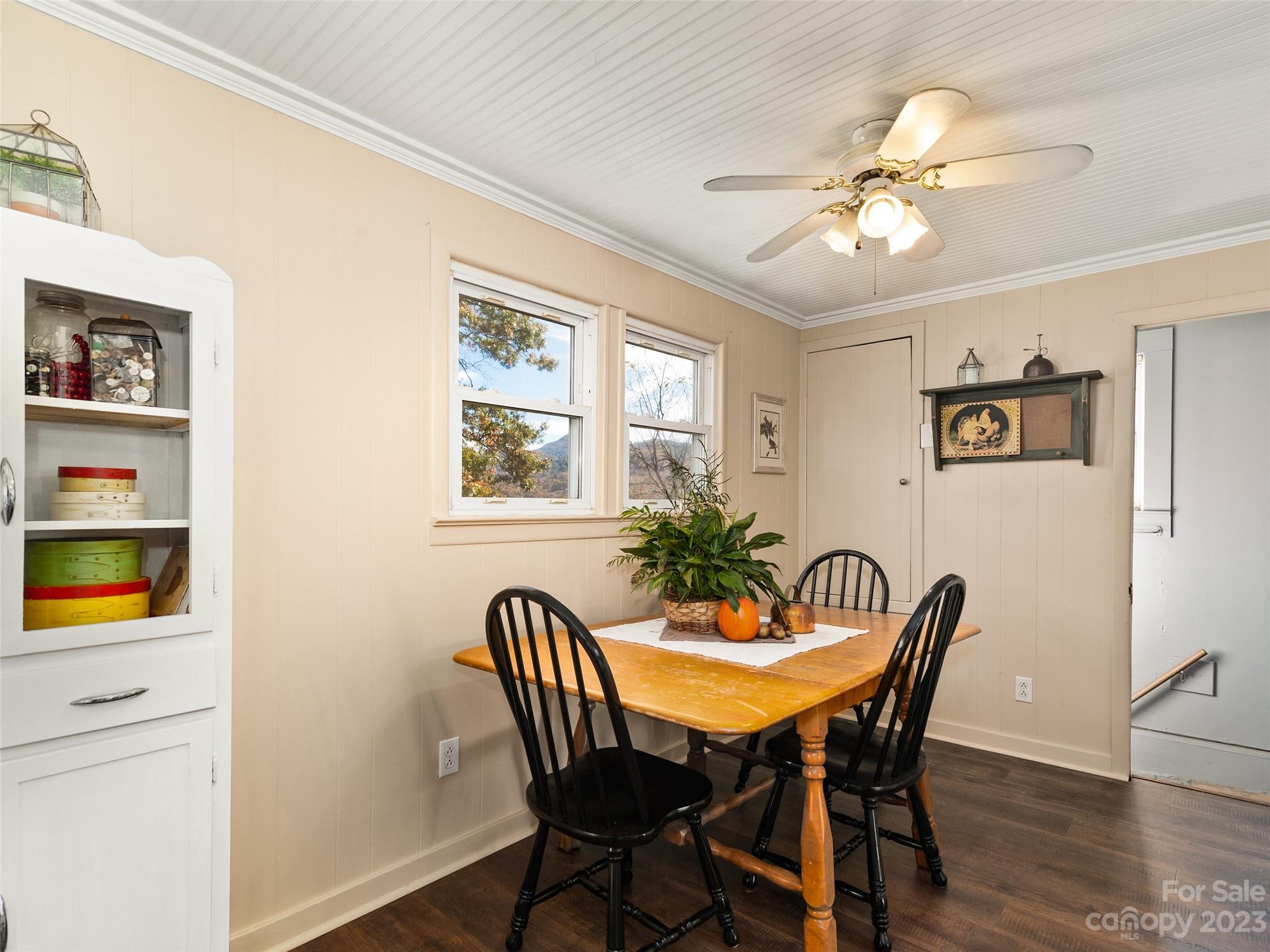 329 Star Ridge Road Canton, NC 28716 - Photo 13 of 37 a view of a dining room with furniture and wooden floor