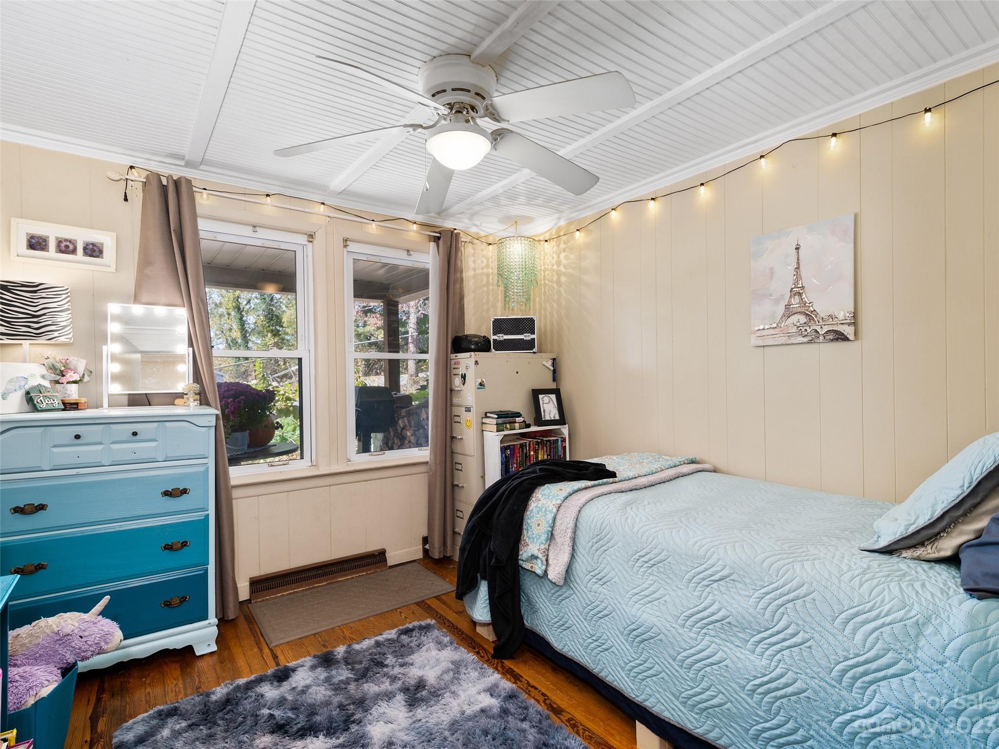 329 Star Ridge Road Canton, NC 28716 - Photo 20 of 37 a bedroom with a bed and a large window with the outer view