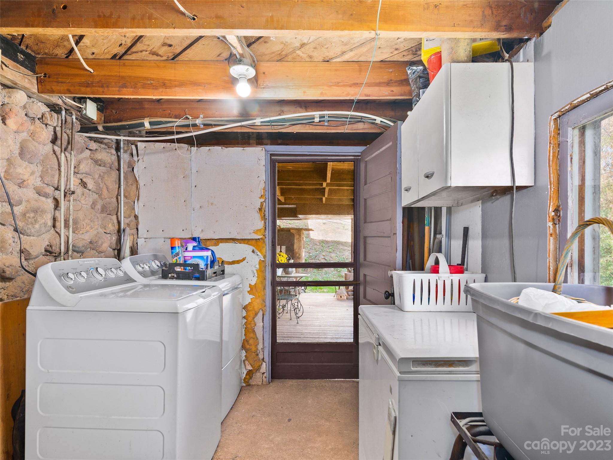 329 Star Ridge Road Canton, NC 28716 - Photo 24 of 37 a storage room with washer and dryer