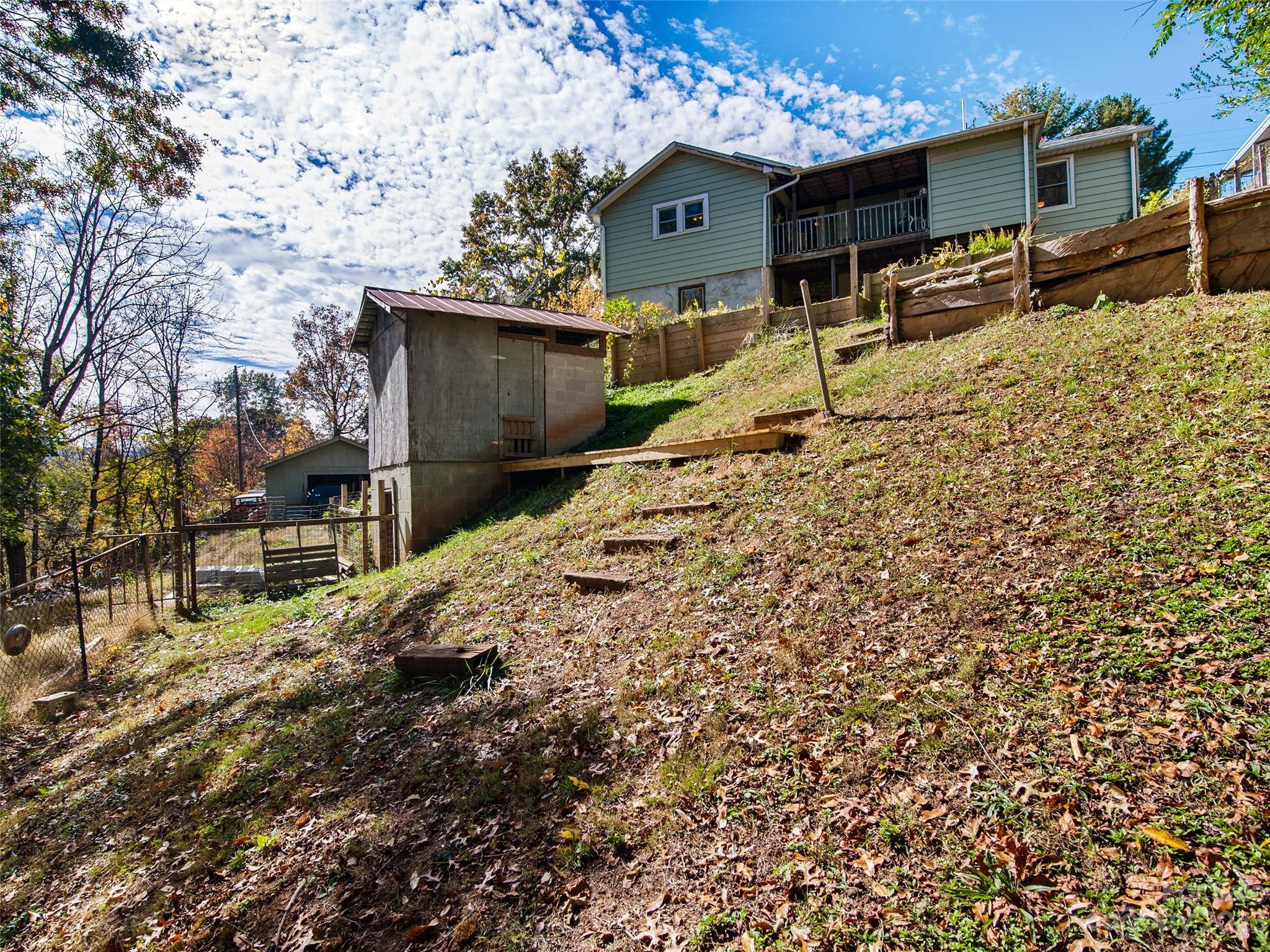 329 Star Ridge Road Canton, NC 28716 - Photo 27 of 37 a house that has a tree in front of it