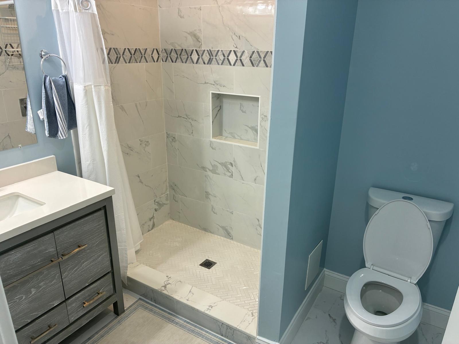 1700 Federal Street Baltimore, MD 21213 - Photo 21 of 41 Modern hall bathroom with elegant finishes.