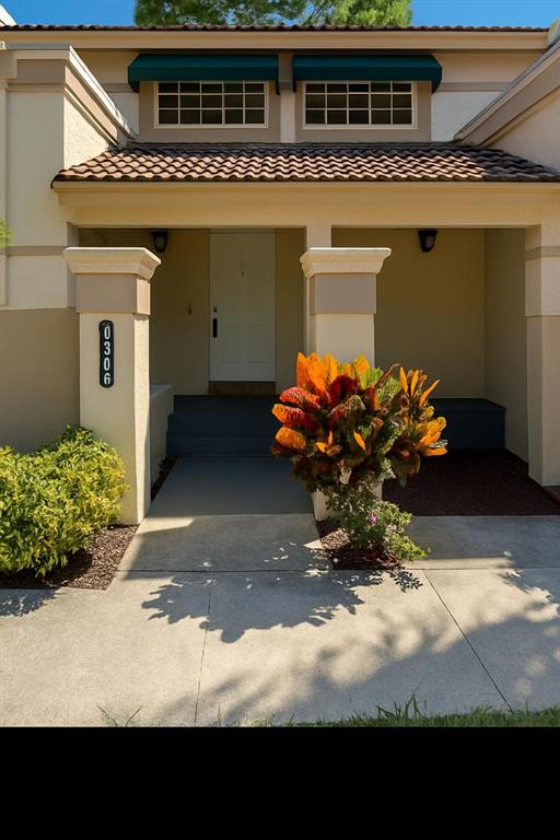 6596 Via Regina, Unit 6596 Boca Raton, FL 33433 - Photo 1 of 16 a view of a house with a yard