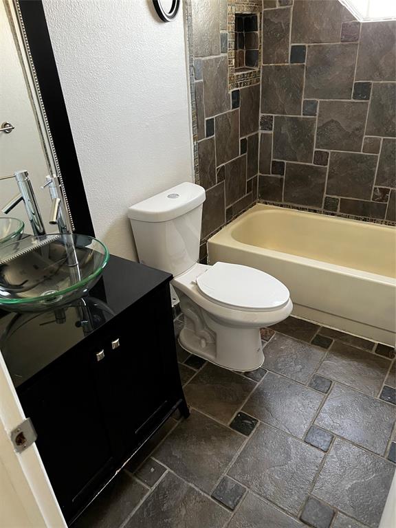 6596 Via Regina, Unit 6596 Boca Raton, FL 33433 - Photo 15 of 16 a bathroom with a sink toilet and shower