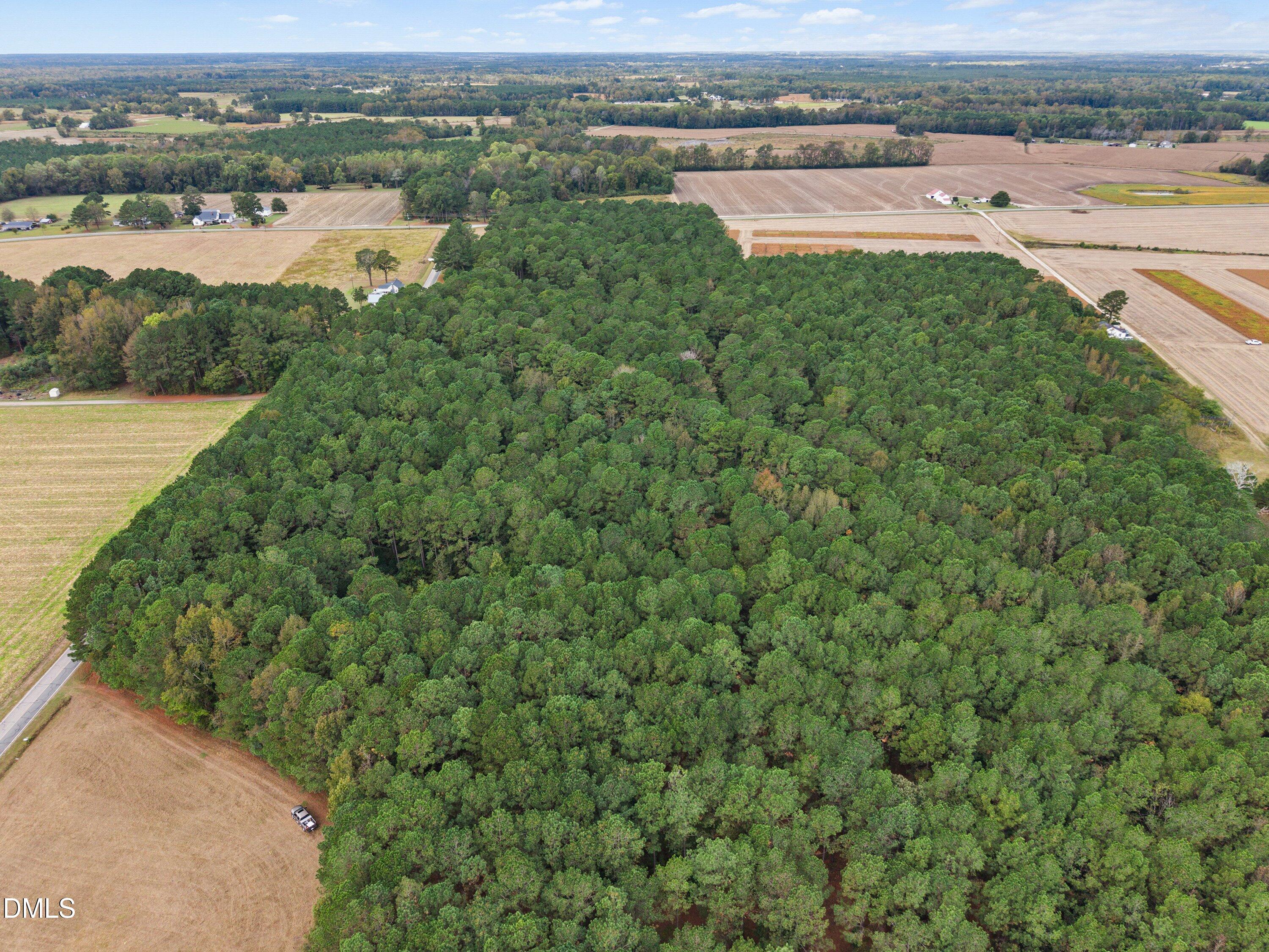 0 Crocker Road Smithfield, NC 27577 - Photo 7 of 14 a view of a lake with a city view