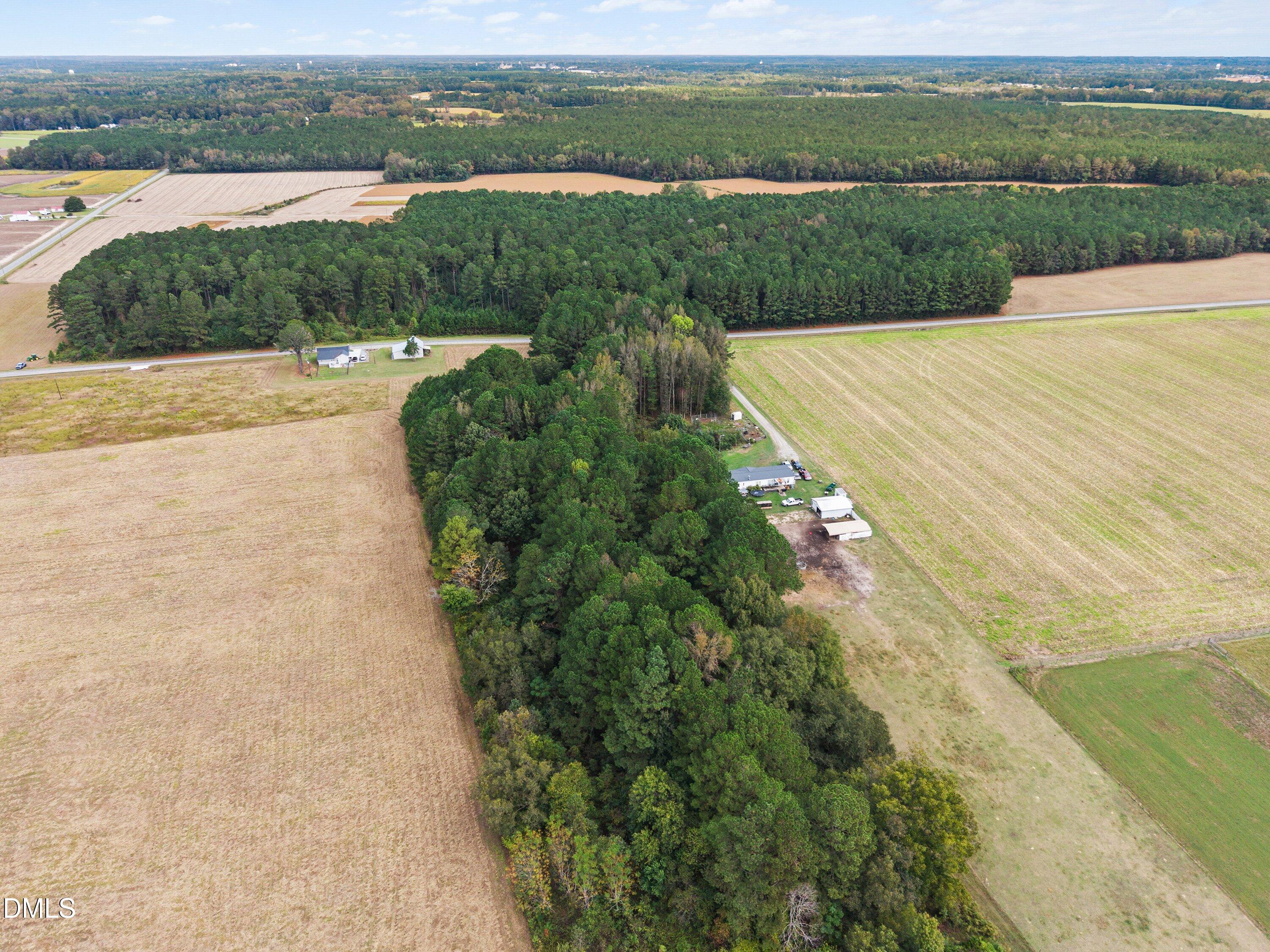 0 Crocker Road Smithfield, NC 27577 - Photo 9 of 14 an aerial view of a house with a yard and lake view