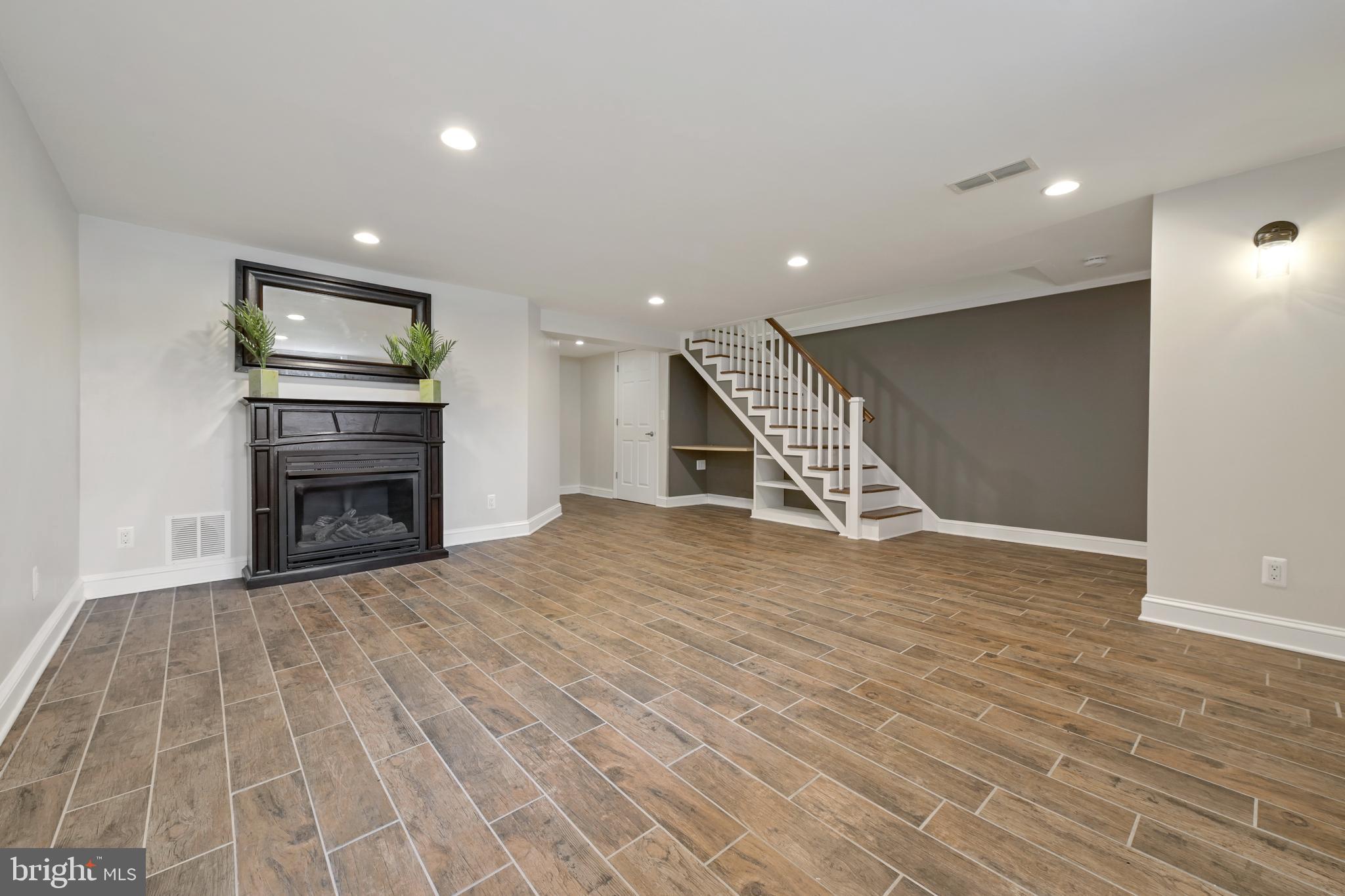 353 Whitfield Road Catonsville, MD 21228 - Photo 22 of 30 Family room with gas fireplace