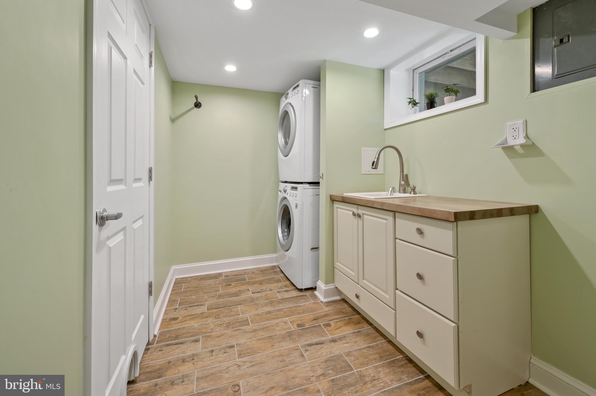 353 Whitfield Road Catonsville, MD 21228 - Photo 25 of 30 Fabulous laundry room with stacked washer & dryer!