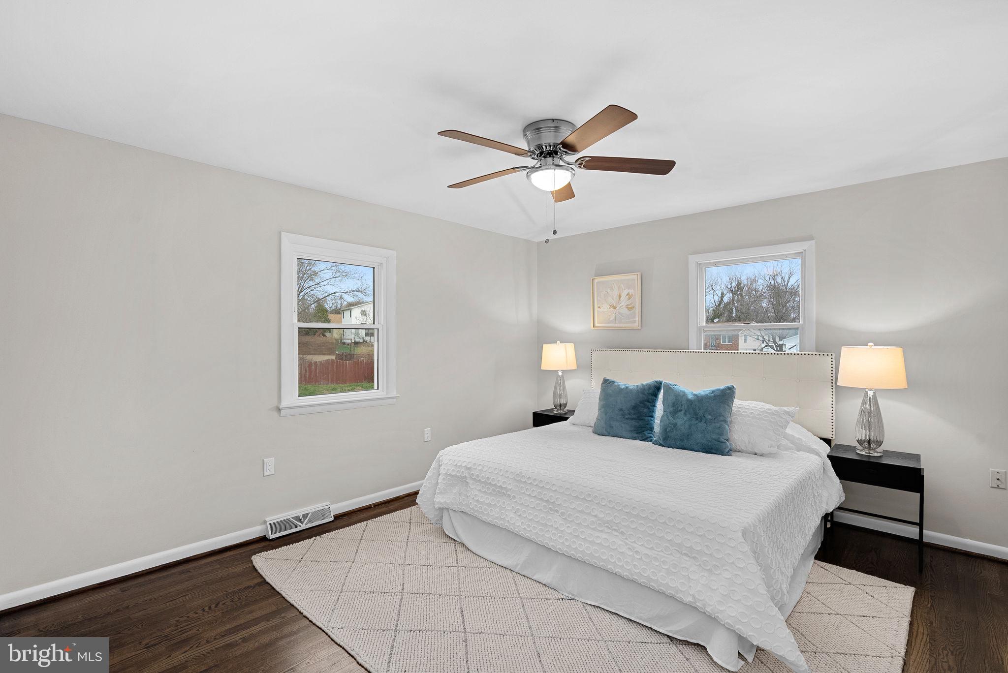 647 Battle Avenue Winchester, VA 22601 - Photo 21 of 44 a bedroom with a bed and a painting on the wall