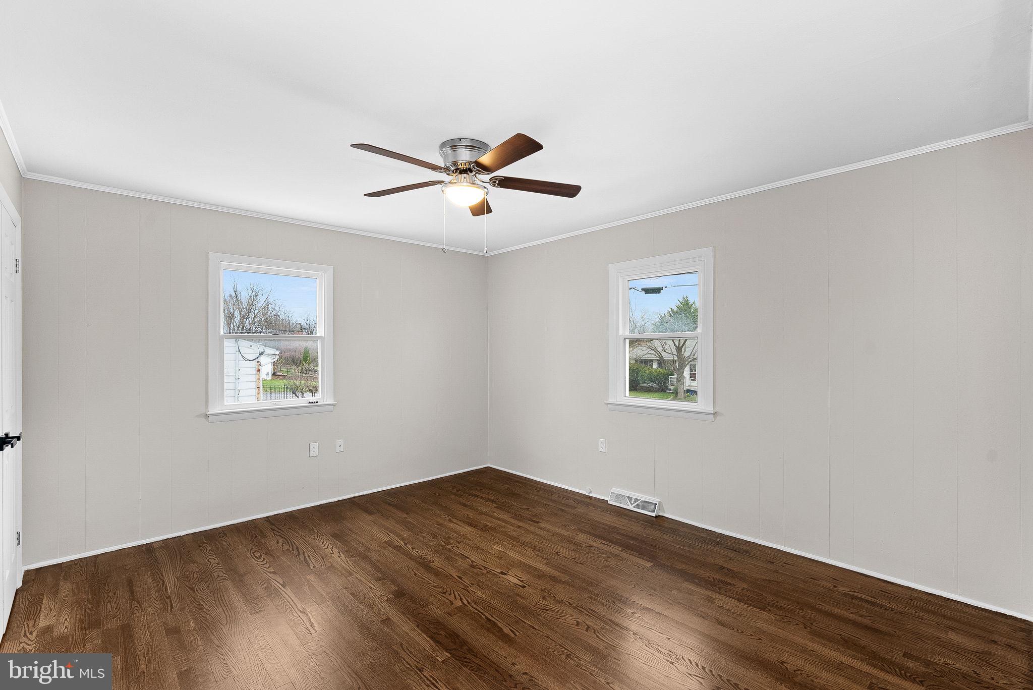 647 Battle Avenue Winchester, VA 22601 - Photo 25 of 44 a view of room with wooden floor and ceiling fan