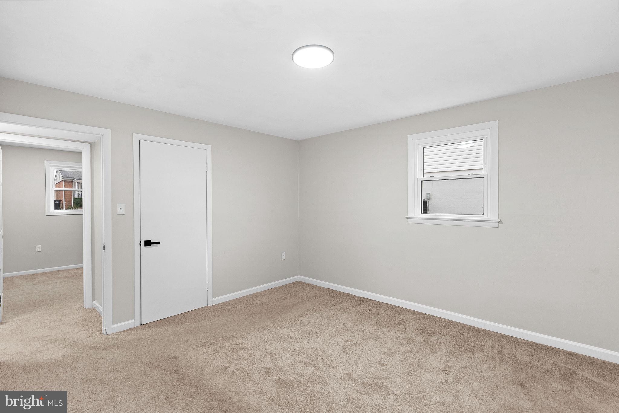 647 Battle Avenue Winchester, VA 22601 - Photo 32 of 44 an empty room with windows and closet