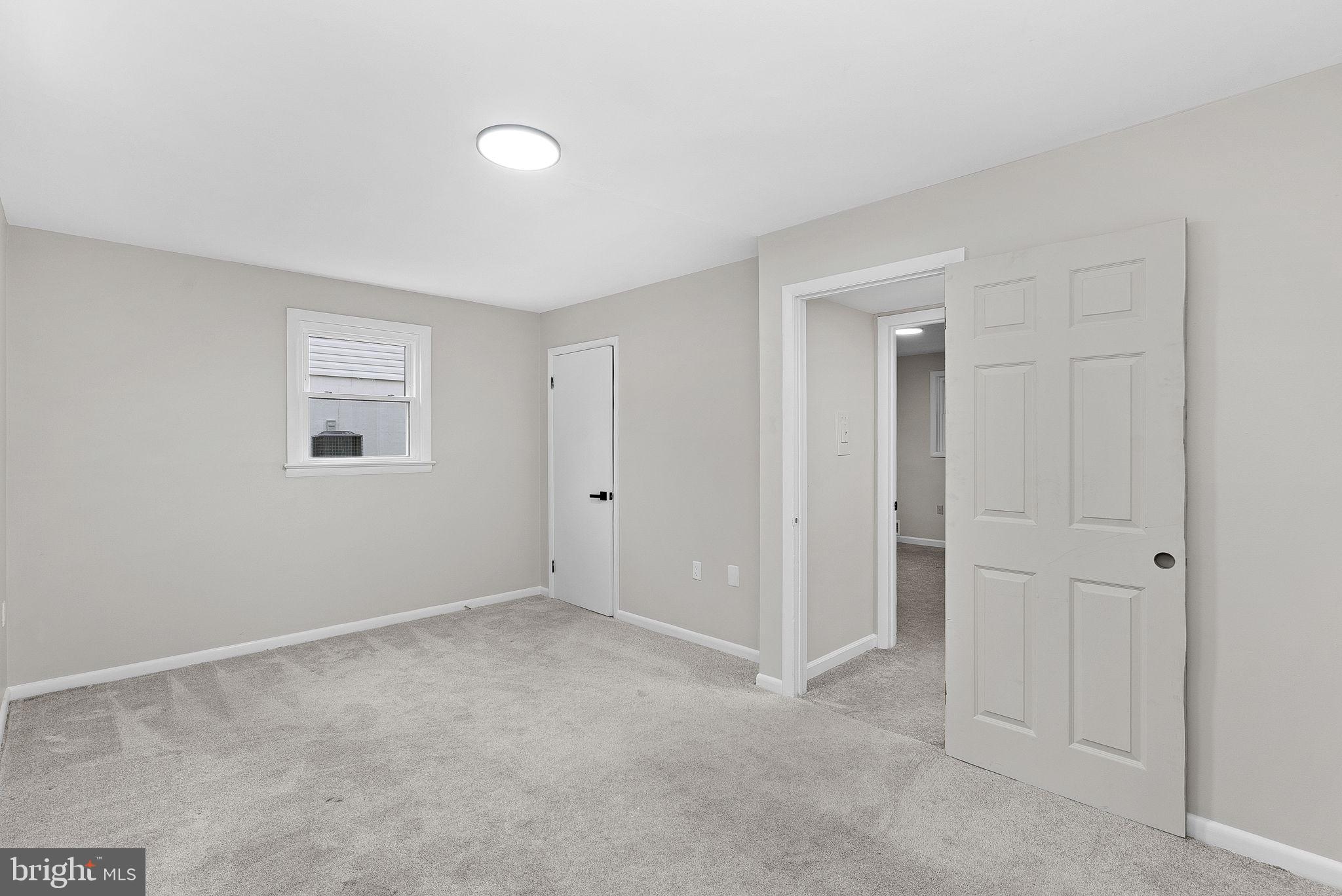 647 Battle Avenue Winchester, VA 22601 - Photo 36 of 44 a view of an empty room with closet and a window