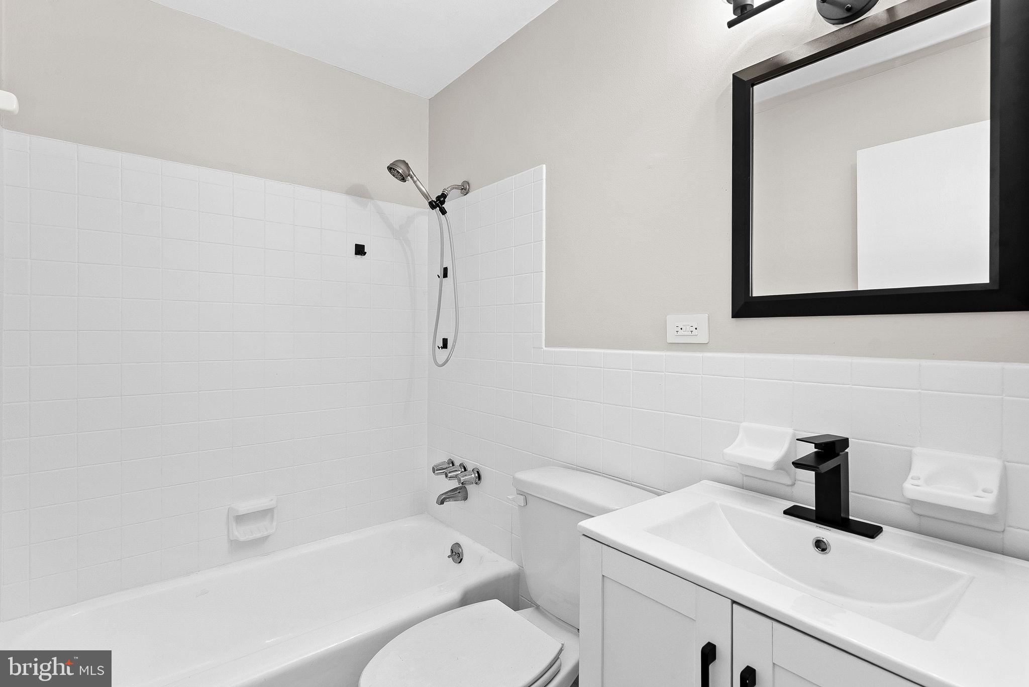 647 Battle Avenue Winchester, VA 22601 - Photo 37 of 44 a bathroom with a sink toilet and shower