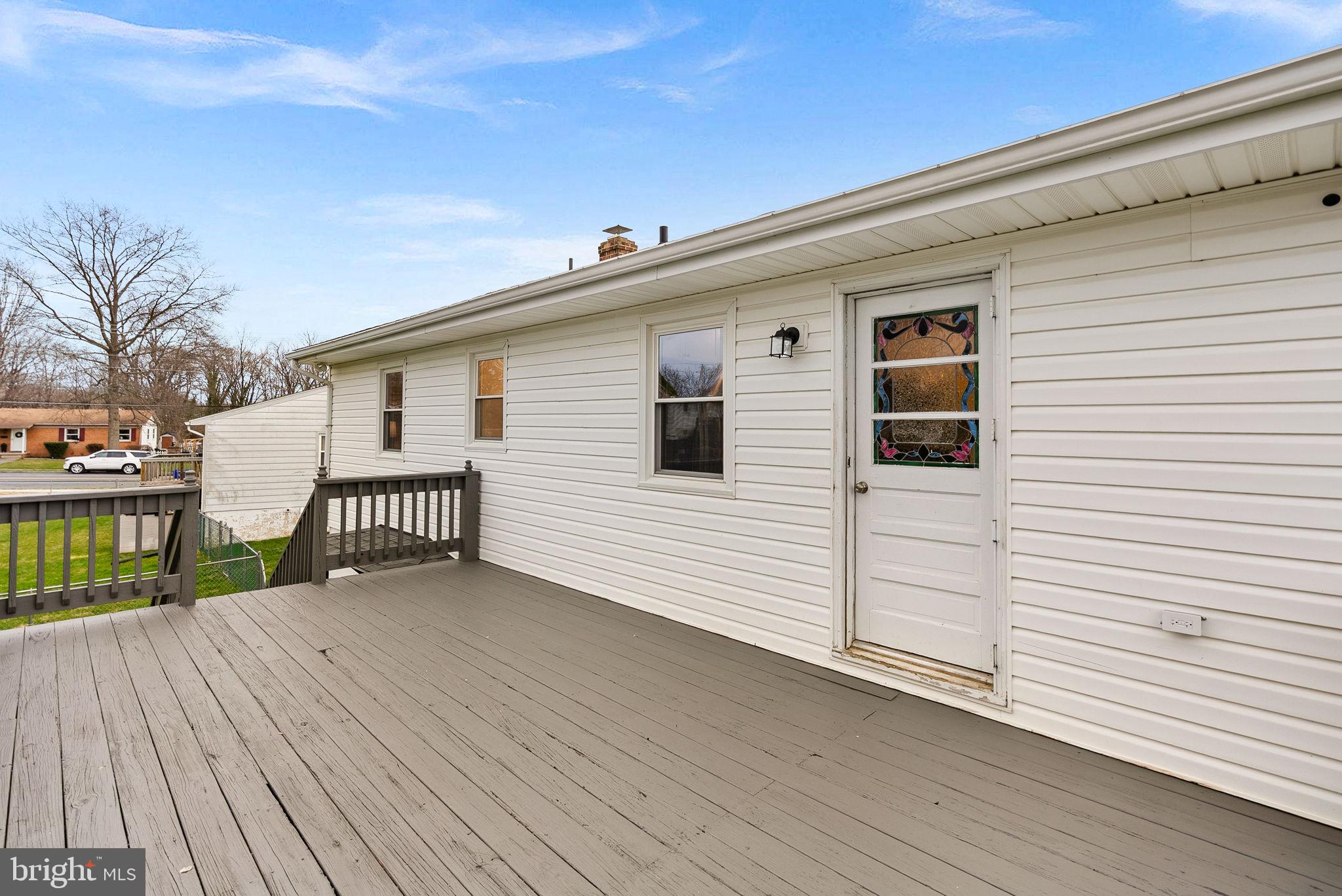 647 Battle Avenue Winchester, VA 22601 - Photo 38 of 44 a view of a balcony with wooden floor