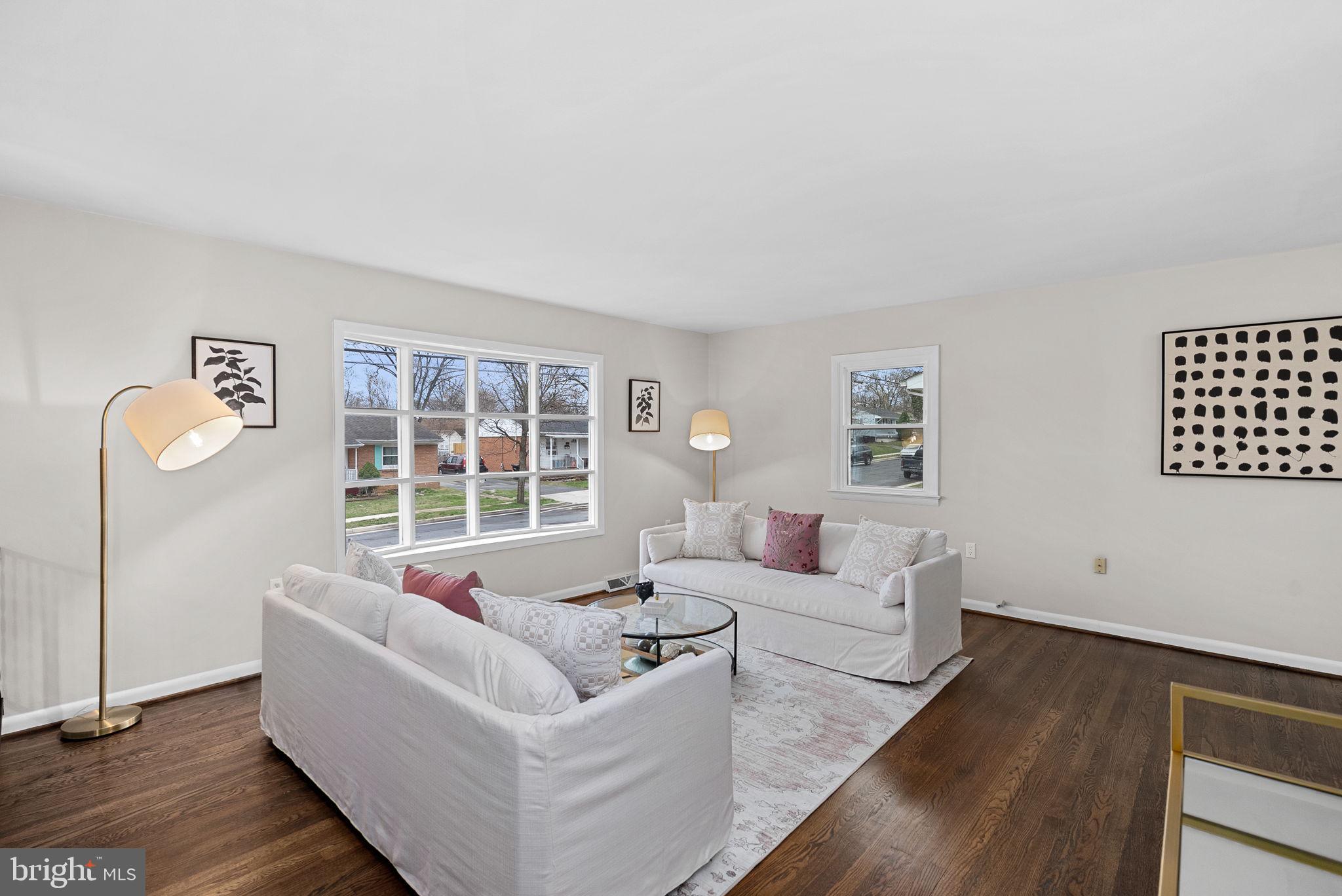 647 Battle Avenue Winchester, VA 22601 - Photo 5 of 44 a living room with furniture and a large window
