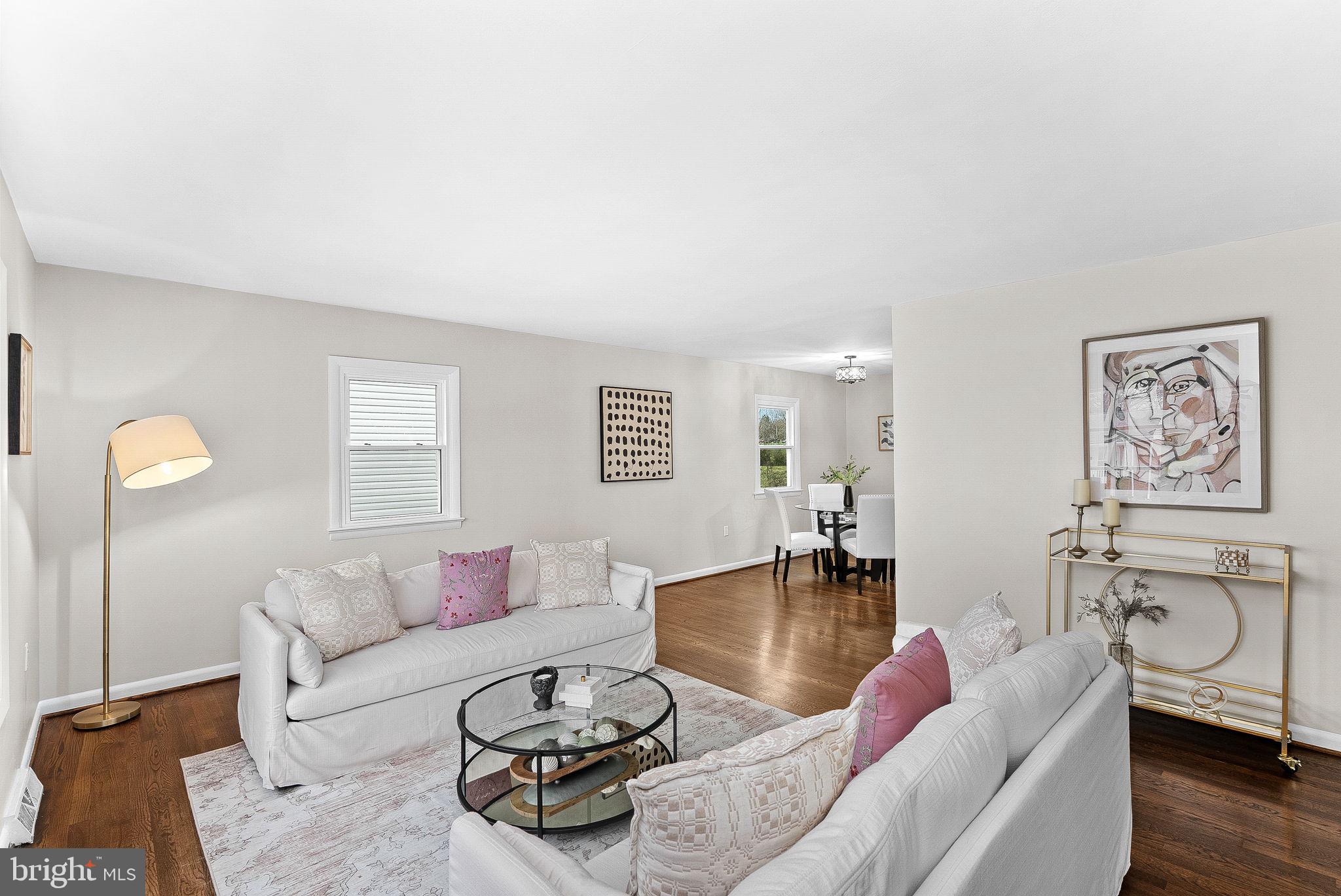 647 Battle Avenue Winchester, VA 22601 - Photo 8 of 44 a living room with furniture a rug and wooden floor