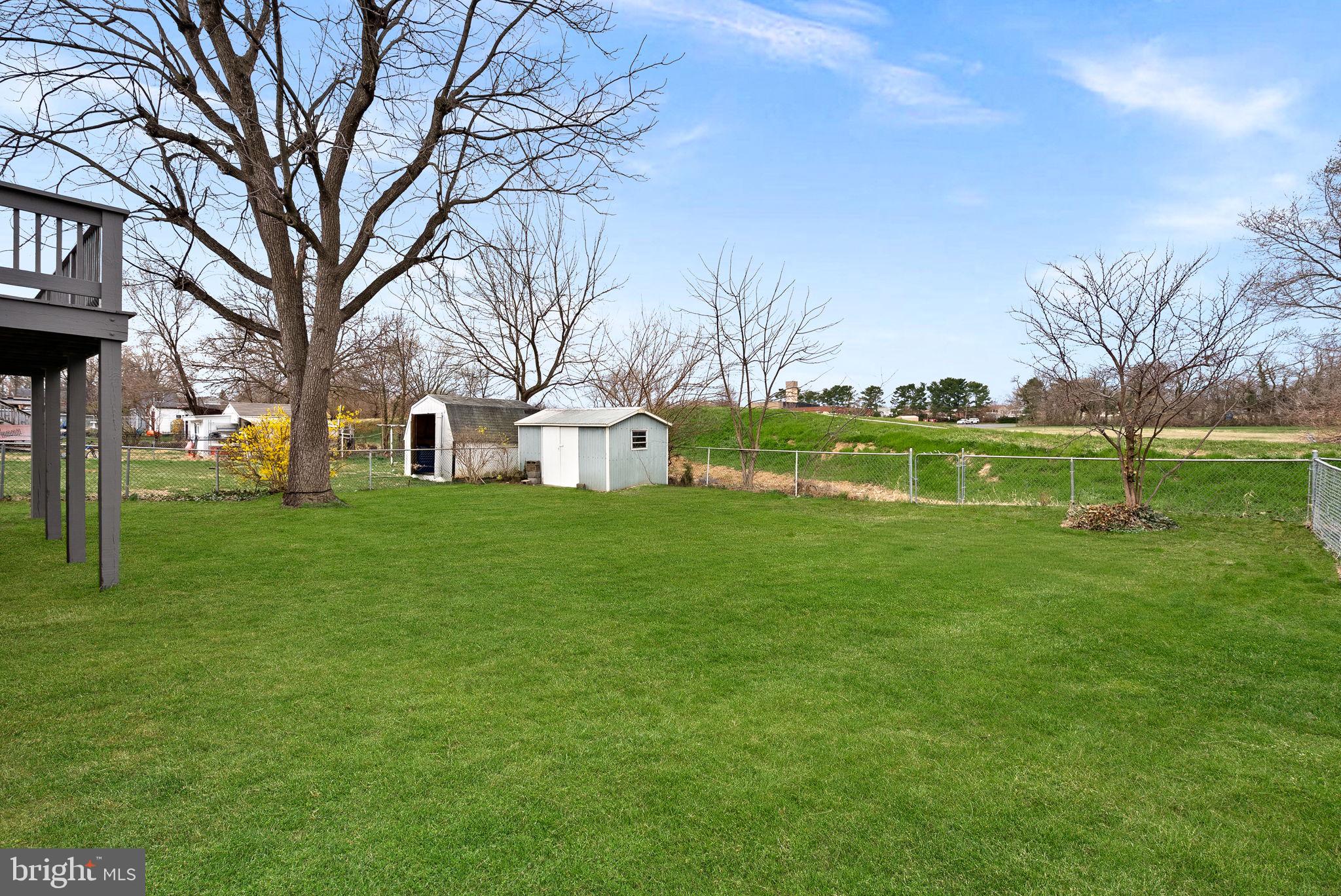 647 Battle Avenue Winchester, VA 22601 - Photo 9 of 9 Rear Fenced Yard w/ Deck, Patio & Shed