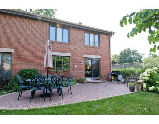 53 Park Lane, Unit 53 Park Ridge, IL 60068 - Photo 14 of 16 a view of a house with backyard and a garden