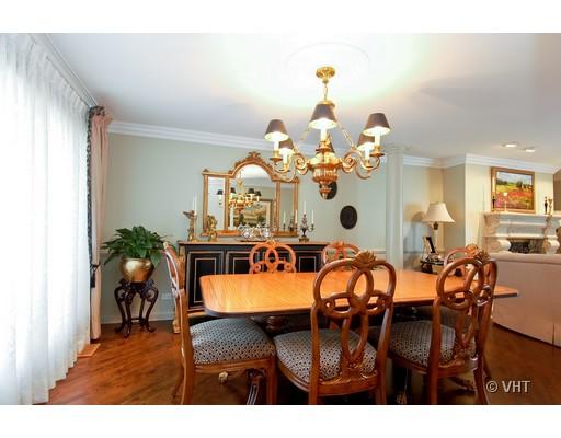53 Park Lane, Unit 53 Park Ridge, IL 60068 - Photo 5 of 16 a view of a dining room with furniture and wooden floor