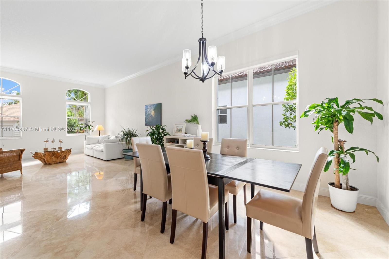1967 Timberline Road Weston, FL 33327 - Photo 14 of 56 a view of a dining room with furniture window and wooden floor