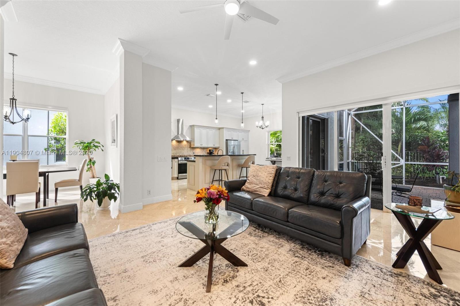 1967 Timberline Road Weston, FL 33327 - Photo 16 of 56 a living room with furniture and a large window