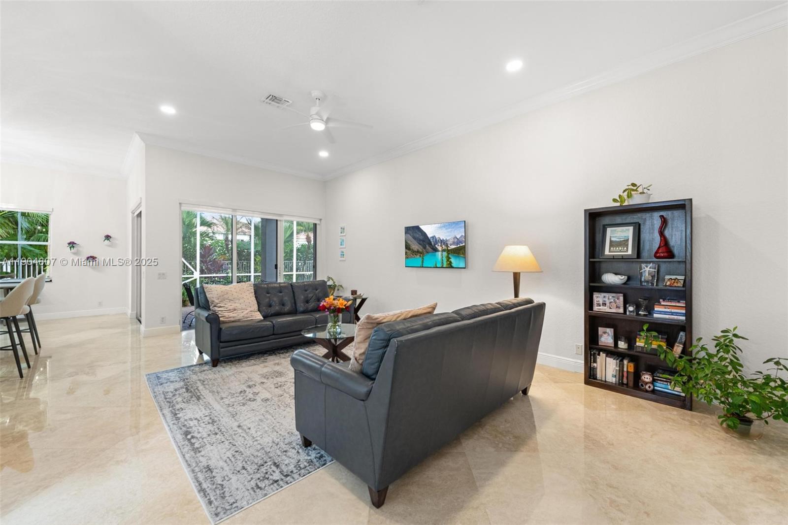 1967 Timberline Road Weston, FL 33327 - Photo 17 of 56 a living room with furniture and a flat screen tv