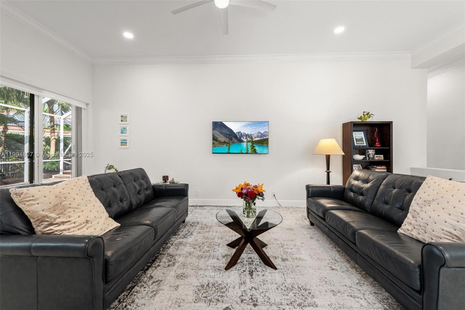 1967 Timberline Road Weston, FL 33327 - Photo 18 of 56 a living room with furniture and a couch