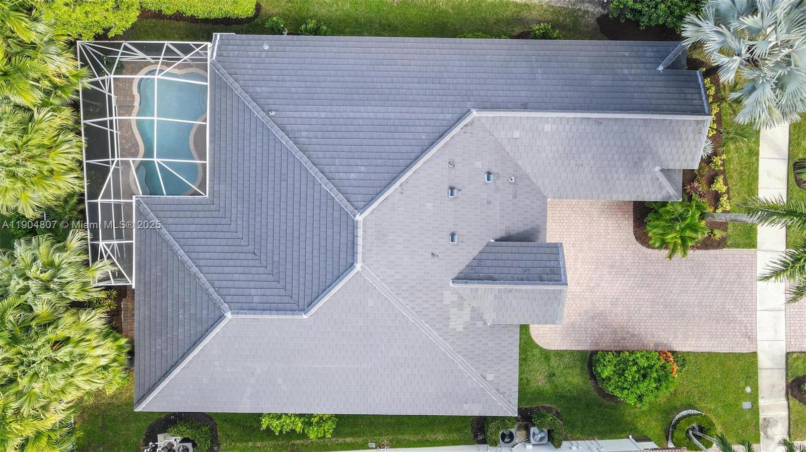 1967 Timberline Road Weston, FL 33327 - Photo 2 of 56 a aerial view of a house with a yard and potted plants
