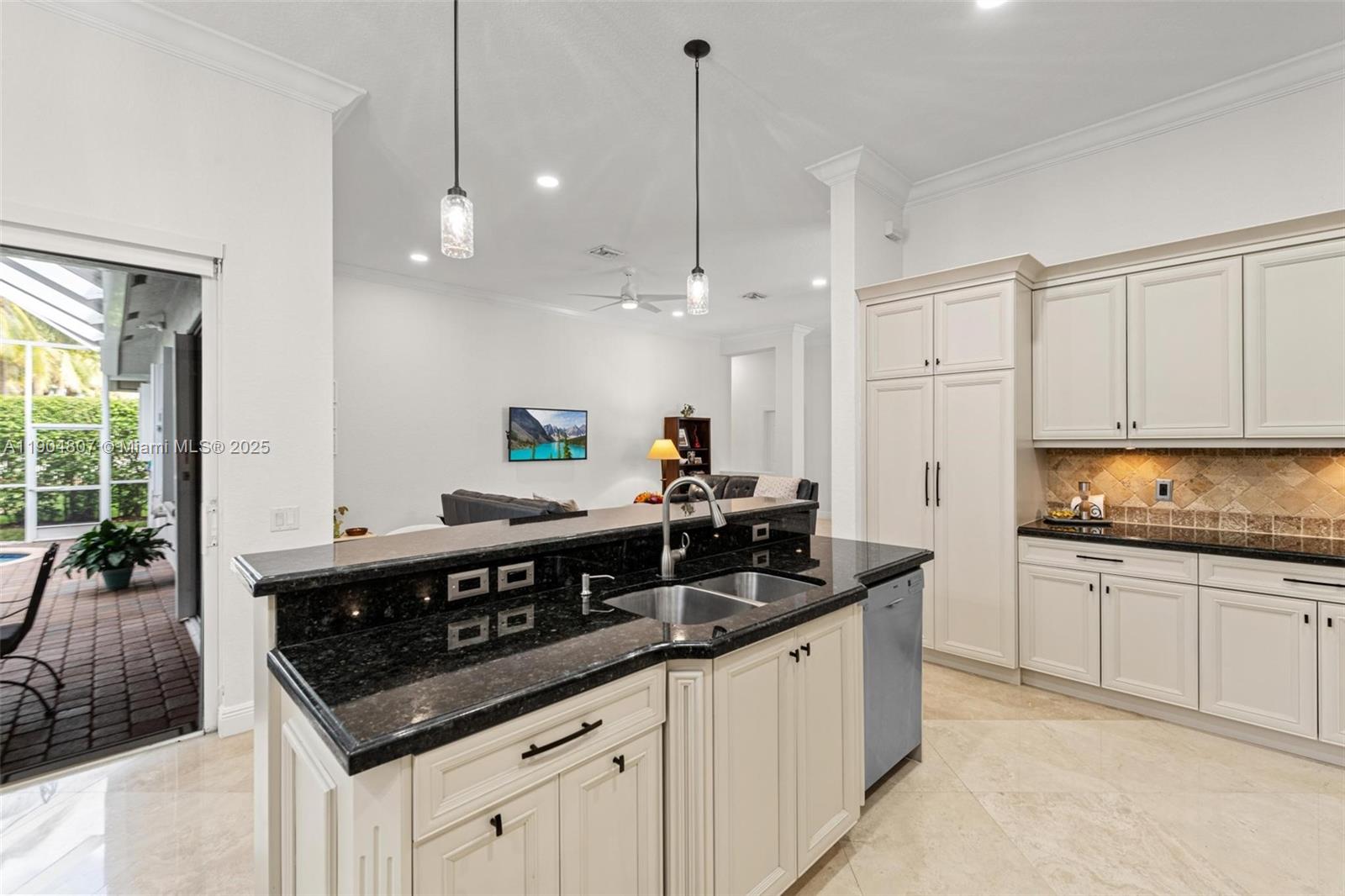 1967 Timberline Road Weston, FL 33327 - Photo 24 of 56 a kitchen with stainless steel appliances granite countertop a sink a stove and a wooden floors