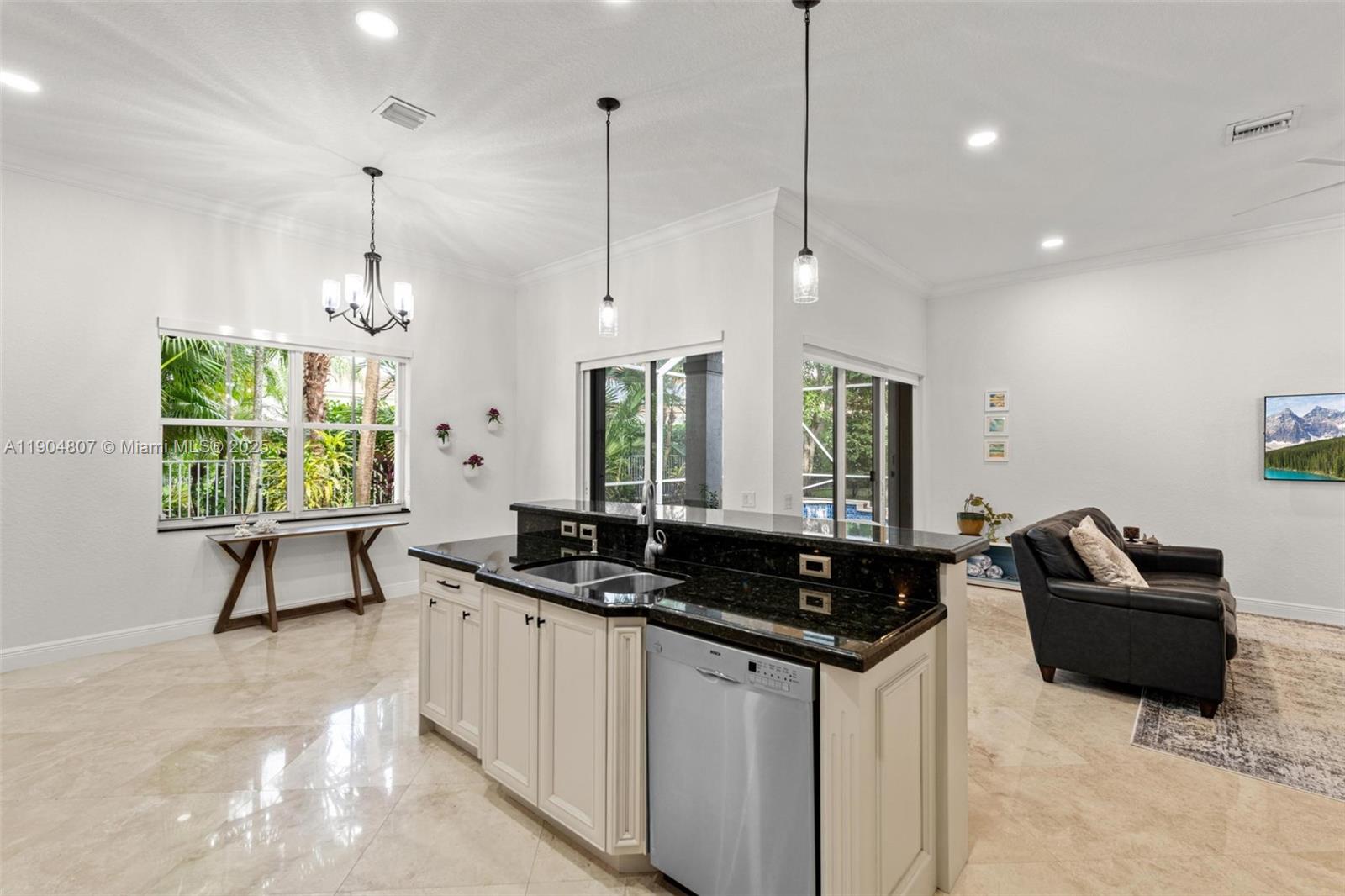 1967 Timberline Road Weston, FL 33327 - Photo 25 of 56 a kitchen that has a sink a counter space and a window