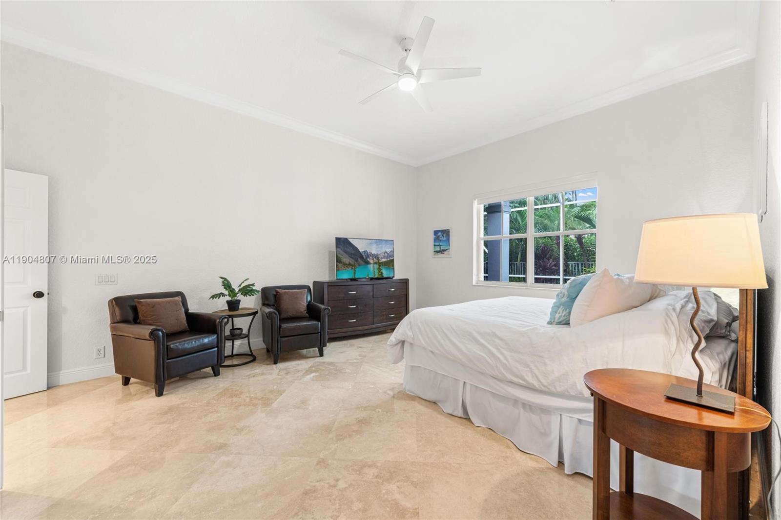 1967 Timberline Road Weston, FL 33327 - Photo 30 of 56 a bedroom with furniture and a window