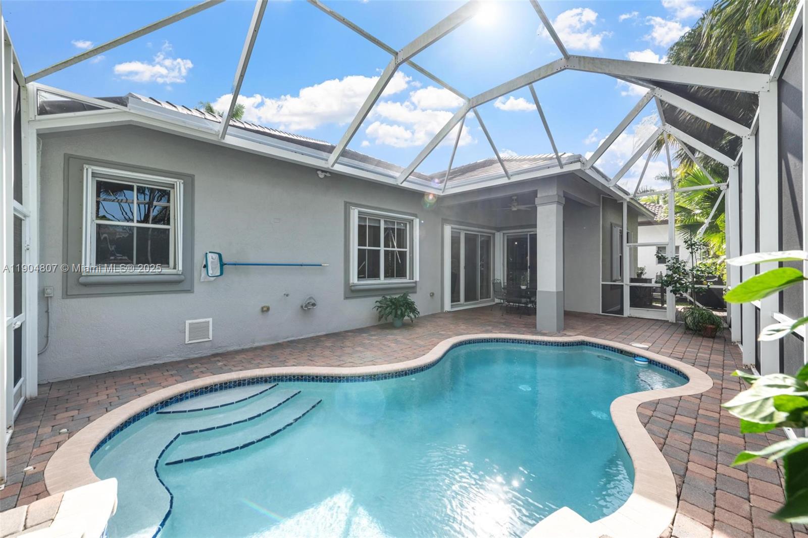 1967 Timberline Road Weston, FL 33327 - Photo 42 of 56 a house view with a sitting space