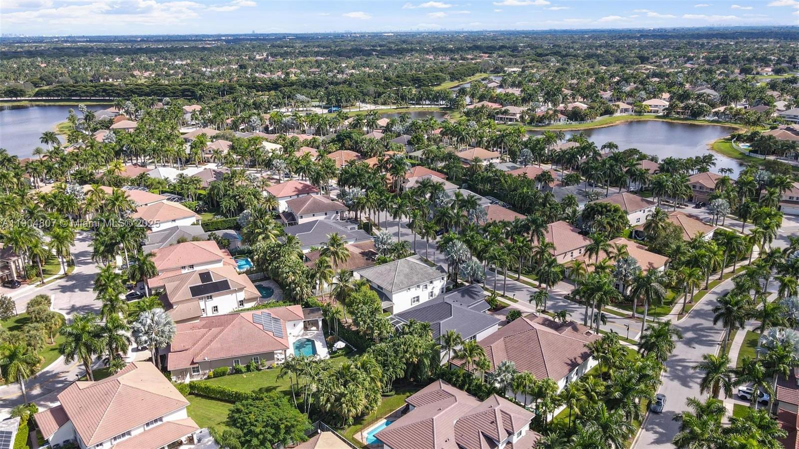 1967 Timberline Road Weston, FL 33327 - Photo 46 of 56 an aerial view of a city with lots of residential buildings