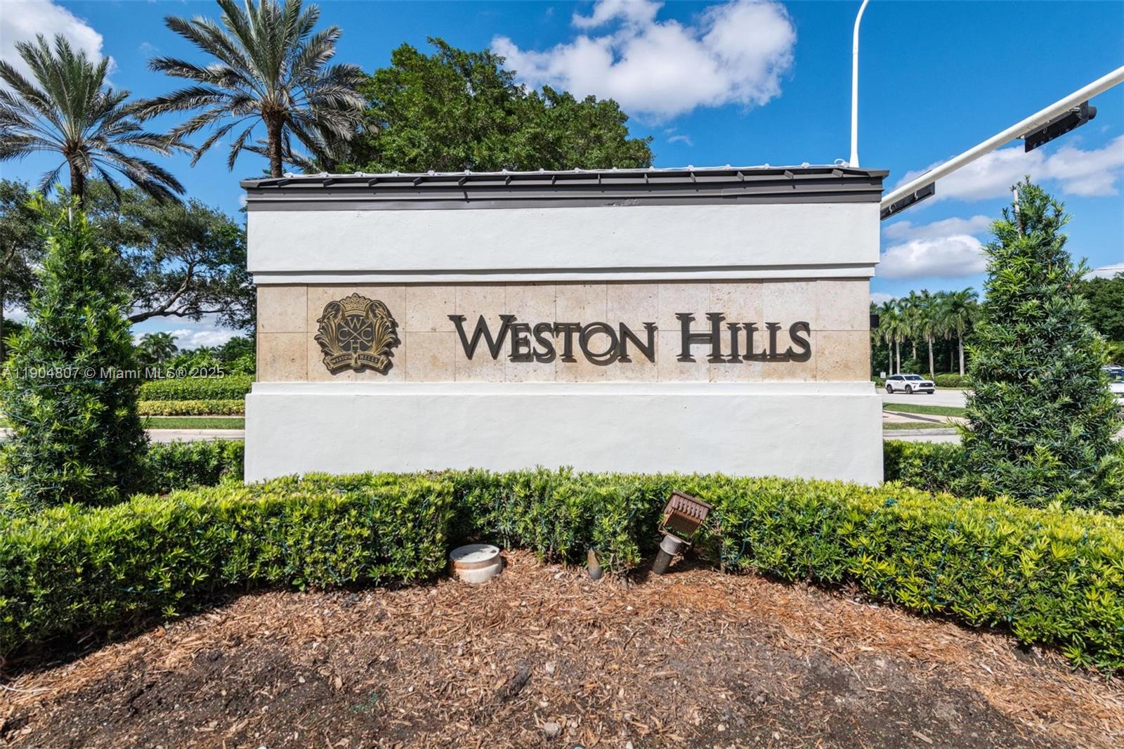 1967 Timberline Road Weston, FL 33327 - Photo 55 of 56 a sign that is on a pole