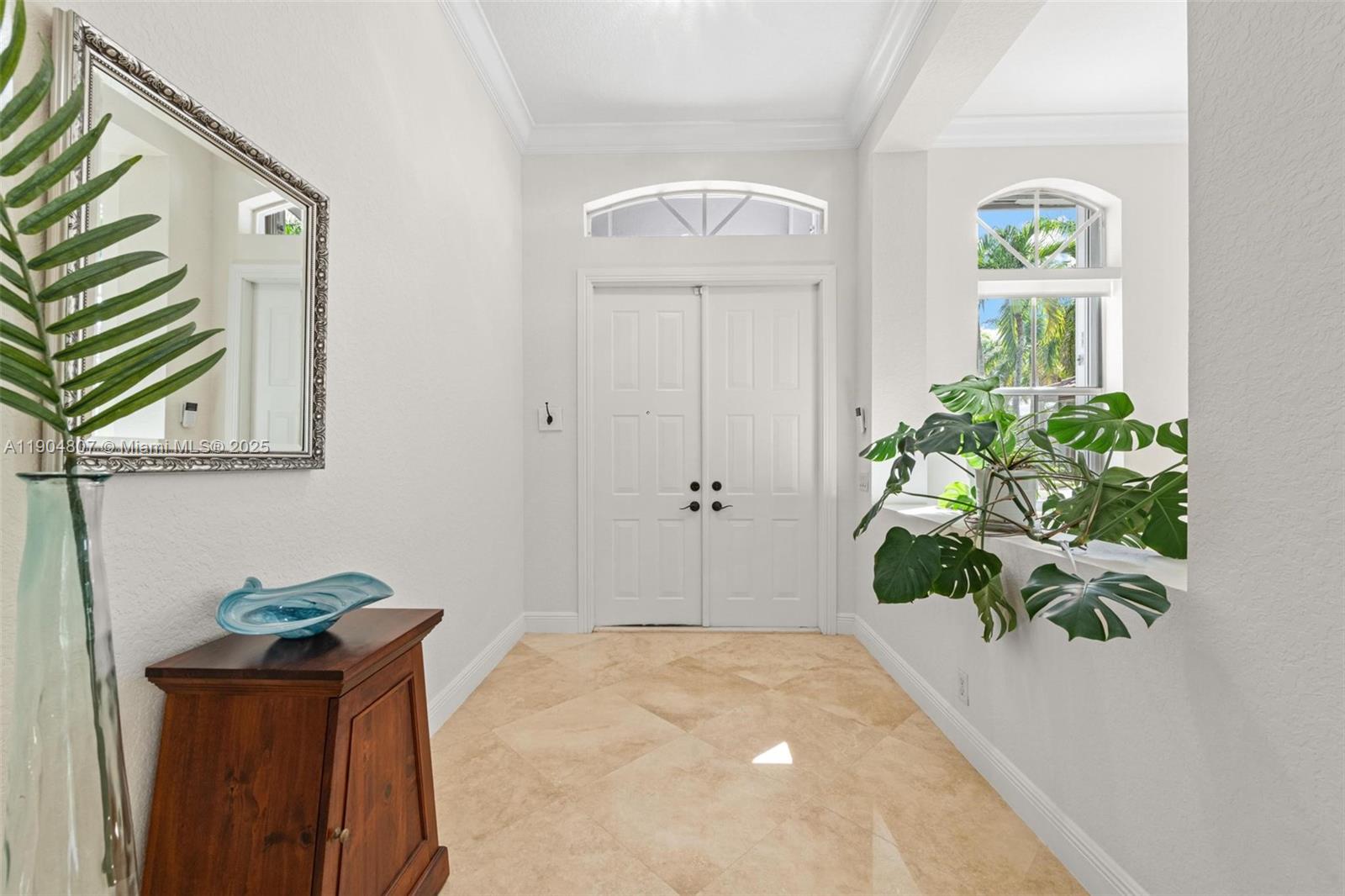 1967 Timberline Road Weston, FL 33327 - Photo 8 of 56 a vase of flowers sitting on a table