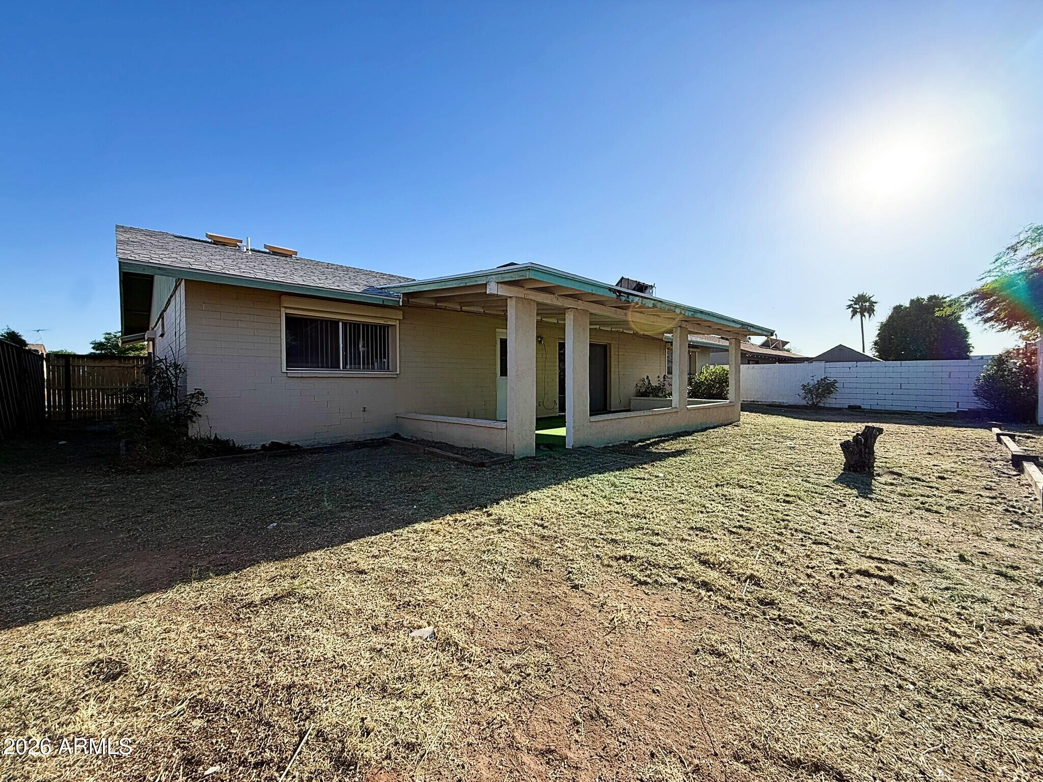 5208 West Calavar Road Glendale, AZ 85306 - Photo 24 of 39 a house view with a backyard space