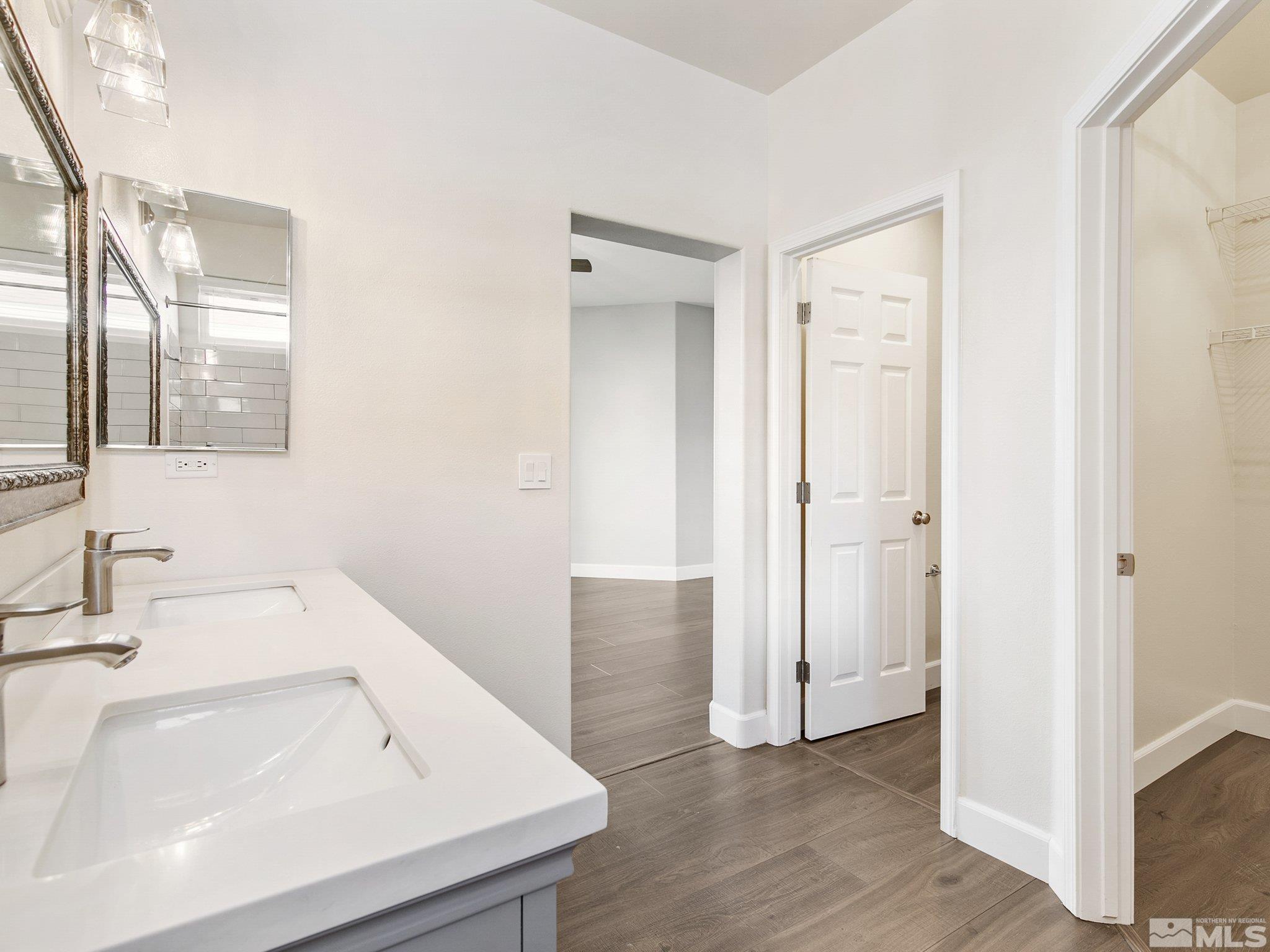 2348 Clementine Lane Reno, NV 89521 - Photo 22 of 38 a bathroom with a sink and a mirror