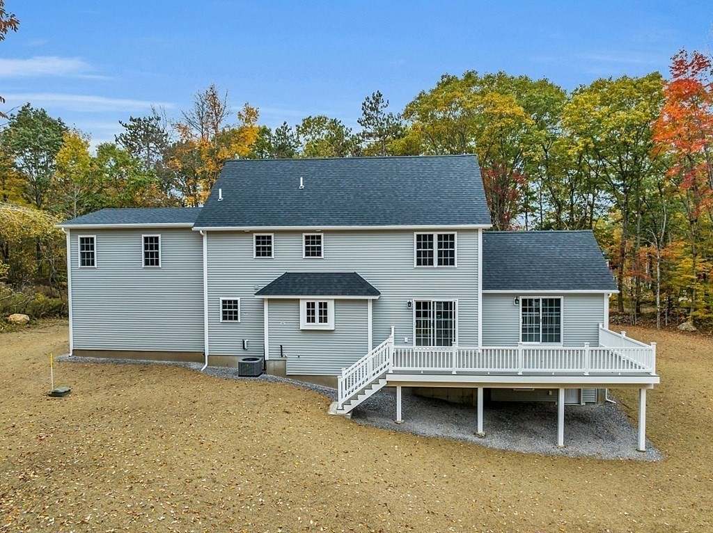 124 French Road, Unit LOT 1 Templeton, MA 01468 - Photo 3 of 42 an aerial view of a house with a garden and deck