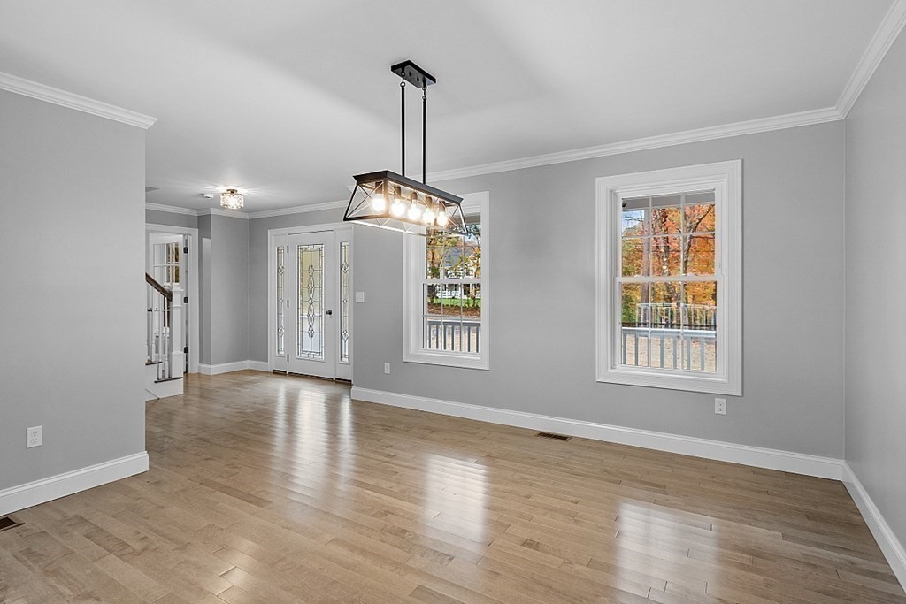 124 French Road, Unit LOT 1 Templeton, MA 01468 - Photo 9 of 42 a view of an empty room with window and wooden floor