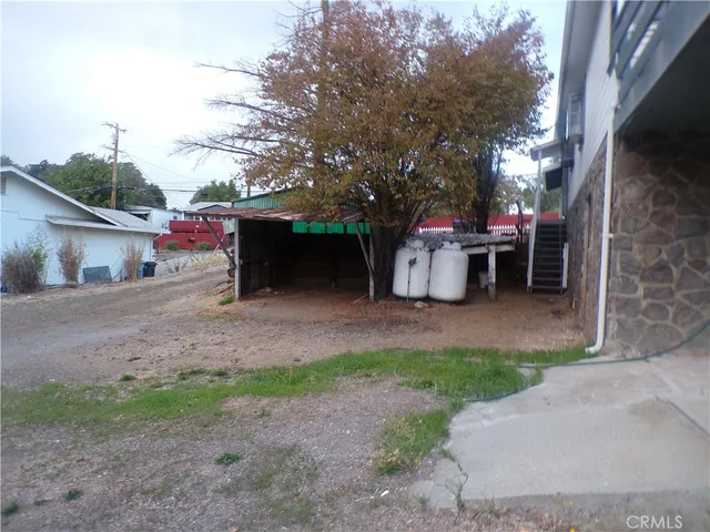 a view of a chairs and tables in the patio