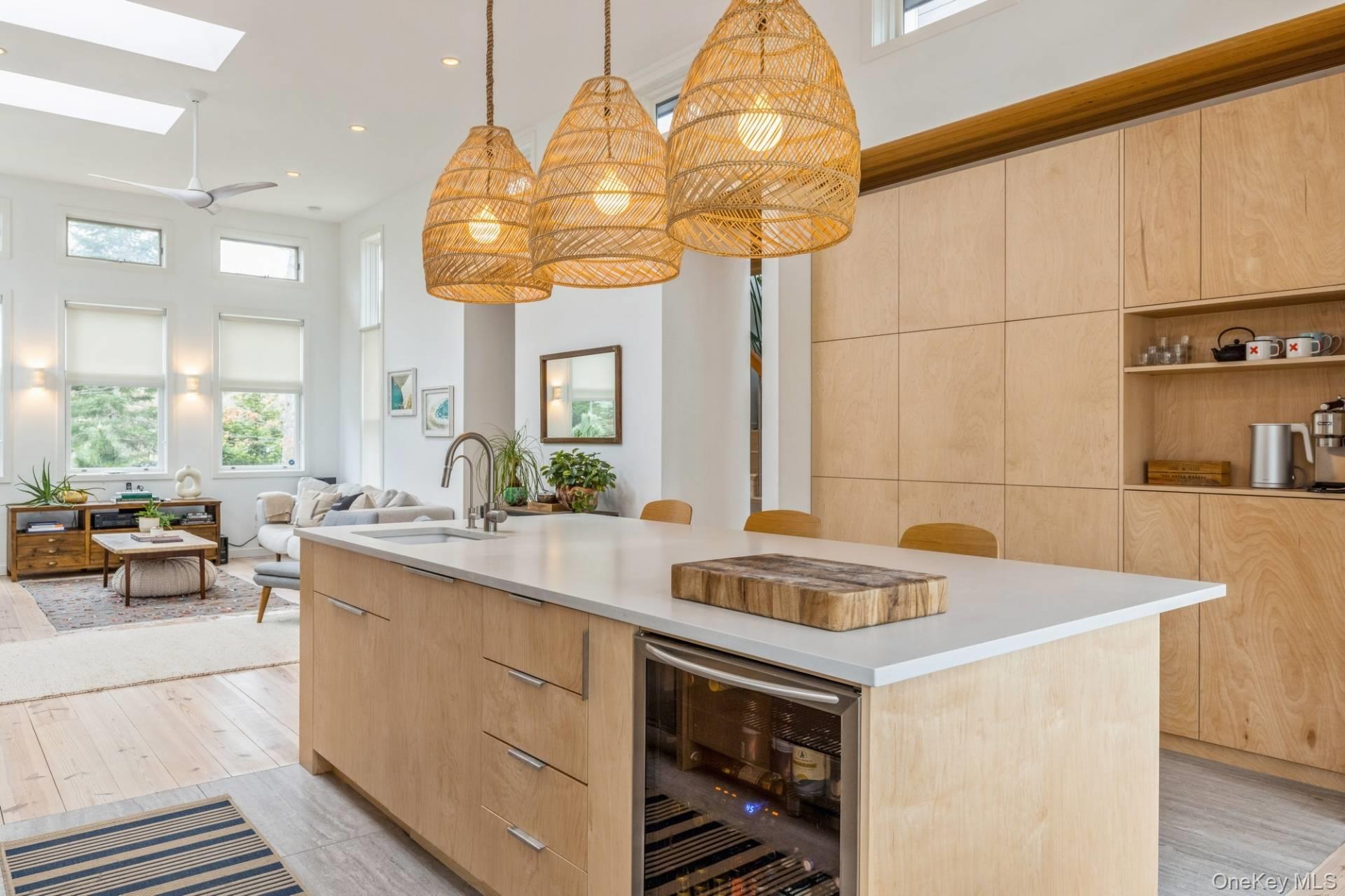 85 Camberly Road East Hampton, NY 11937 - Photo 6 of 17 a kitchen with a sink a counter and cabinets