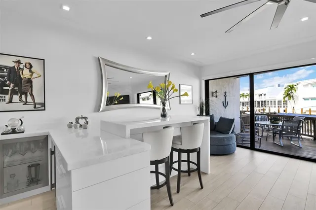 a view of a hallway with paintings on the wall
